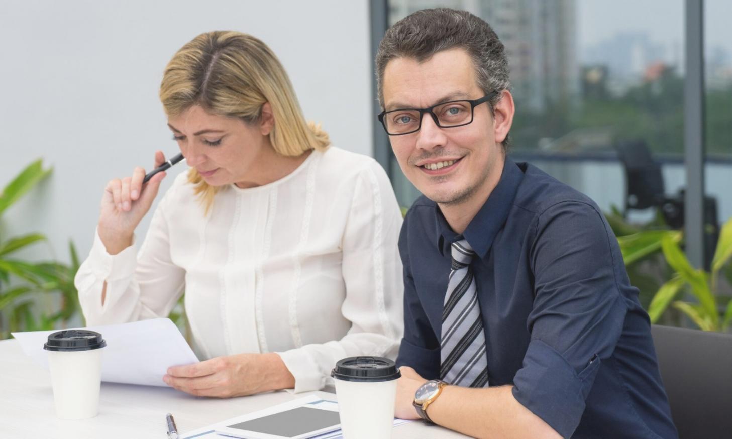 Budgeting tools and savings tracker on desk